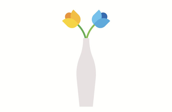 The white vase holds blue and yellow flowers.